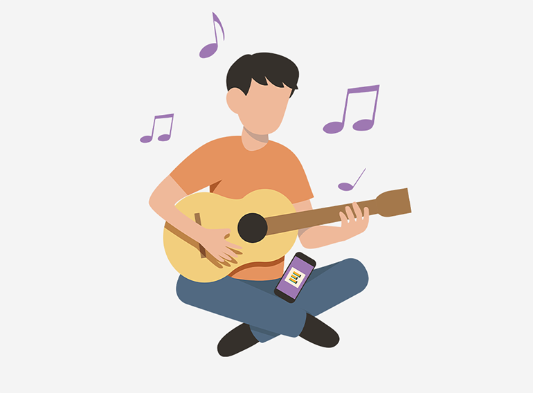 楽器アプリExtrackを使ってコード譜で練習を楽しむ男性