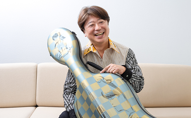 チェロケースと柏木広樹の写真